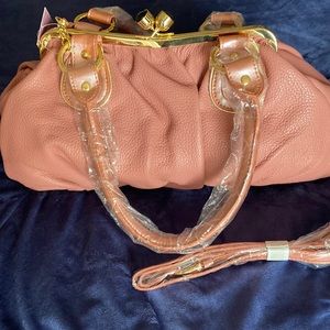 NWT pink leather purse